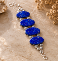 Royal-blue lapis lazuli bracelet with polished oval stones and silver links